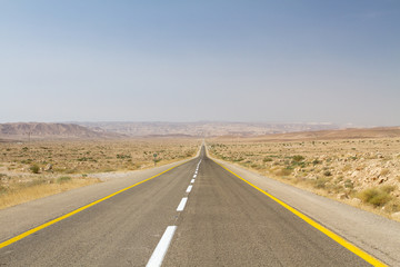 Beautiful road in the desert .