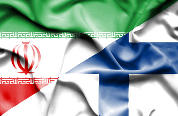 Waving flag of Finland and Iran.