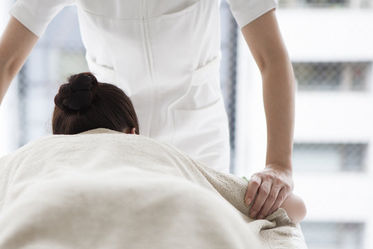 Women receiving arm massage