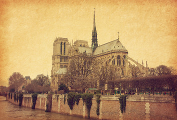 Notre Dame de Paris. View from the south. Photo in retro style. Paper texture.
