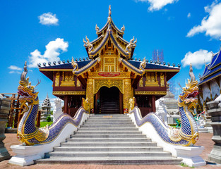 Fototapeta premium Naka statue on staircase balustrade at Thai Buddhist pagoda