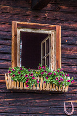 Fototapeta na wymiar Window from a mountain hut