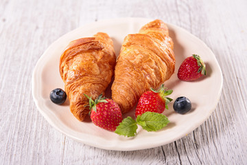 croissant and berry fruit