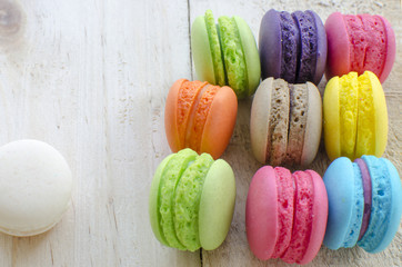 Macaroons colorful on wood background