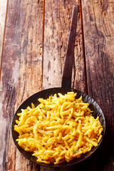 Golden Bavarian spaetzle with copyspce