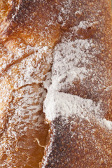 Bread, a set of variation of breads on a wood chopping block with spike
