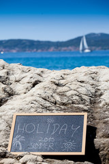 Blackboard with holiday text