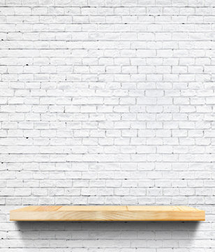 Empty Wooden shelf at white tile ceramic wall,Template mock up f