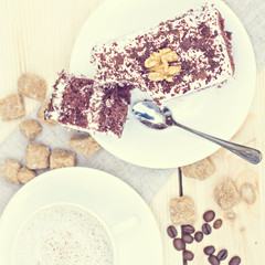 Delicious chocolate cake on plate on table on light background