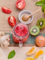 Freshly tomato juice with tomato slice, ginger ,oranges , honey
