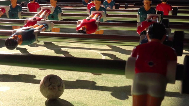 Table Soccer, Blue and Red Players in Football Kicker Game, Selective Focus, Retro Cinematic Tone Effect