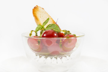 tomatoes and cheese on white plate in a restaurant