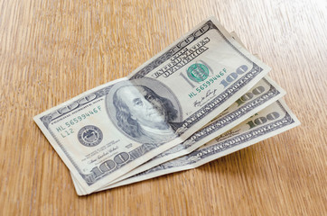 three hundred dollars on the table