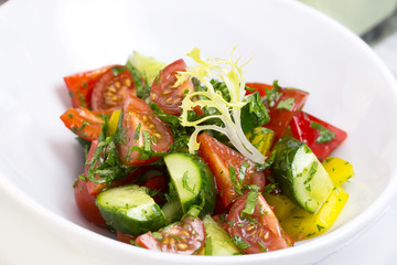 vegetable salad cucumber tomato pepper with sunflower oil