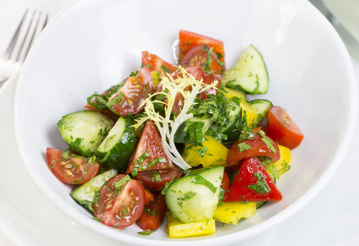 vegetable salad cucumber tomato pepper with sunflower oil