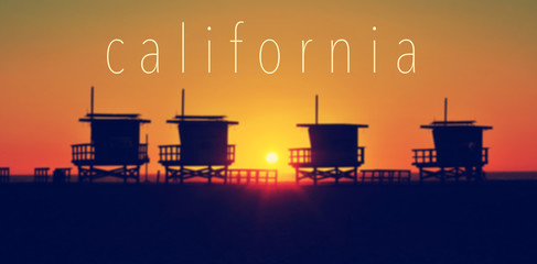 the word California and some lifeguard towers in Venice Beach at