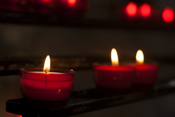 red candles in a church