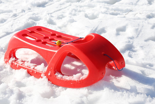 reb sled for playing in the snow in winter