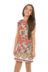 Elegant dark-haired girl in a beautiful silk, fashionable short 