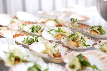 on a buffet appetizer: scallops, onion