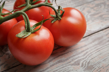 Fresh Tomatoes on Rustic Wooden Table