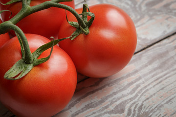 Fresh Tomatoes on Rustic Wooden Table