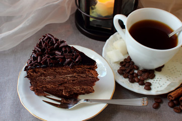 A piece of chocolate cake and coffee..