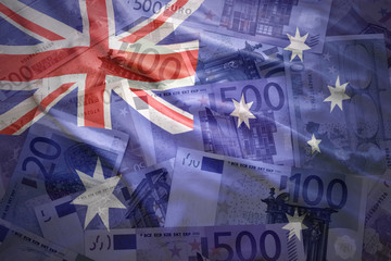 colorful waving australian flag on a euro money background