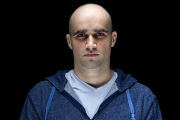 Portrait of young hairless man