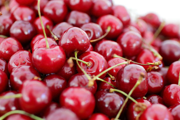 dish with fresh cherries closeup