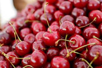 dish with fresh cherries closeup