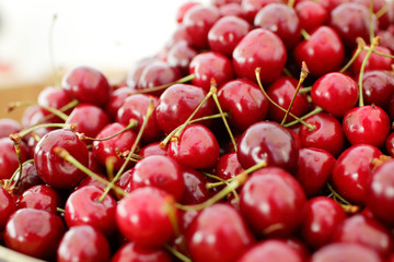dish with fresh cherries closeup