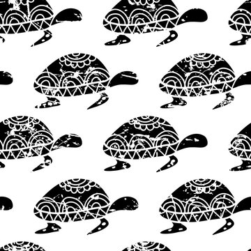 Vector seamless pattern with hand drawn black turtle isolated on
