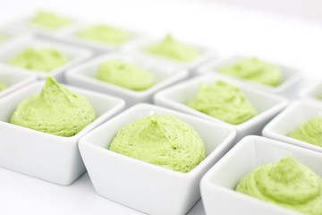 butter mixed with herbs in small plates at the buffet