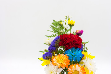 Colorful flower bouquet arrangement in vase isolated on white ba