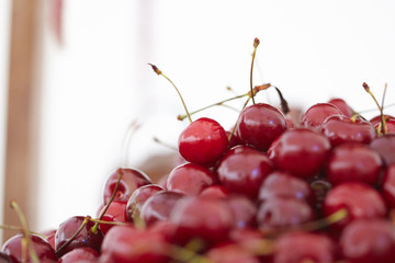 dish with fresh cherries closeup