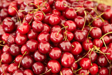 dish with fresh cherries closeup