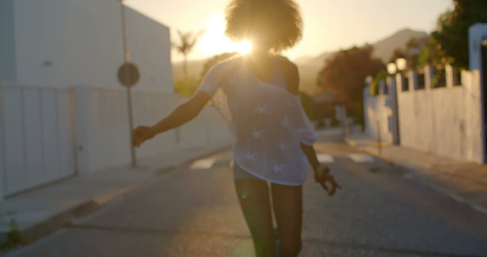 Sexy Roller Skate Girl Riding at Sunset