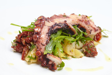 octopus with potatoes, arugula
