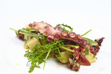 octopus with potatoes, arugula