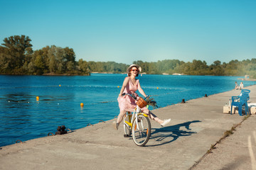 Fototapeta premium Girl riding a bicycle