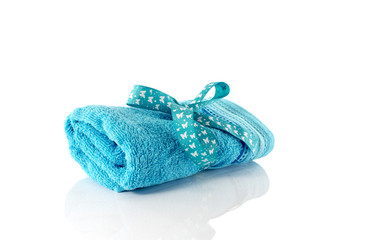 one rolled blue towel