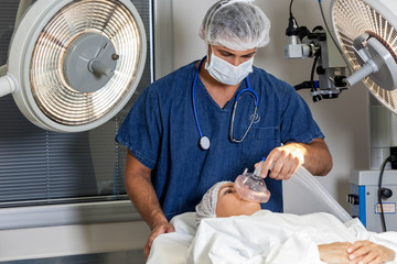 Doctor putting anesthesia