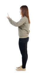 Back view of  pointing woman.