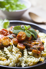 serving of Italian spaghetti on wood table