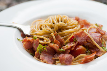Spaghetti with dried chilli ,bacon and garlic.