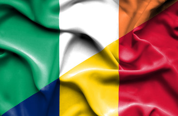 Waving flag of Chad and Ireland