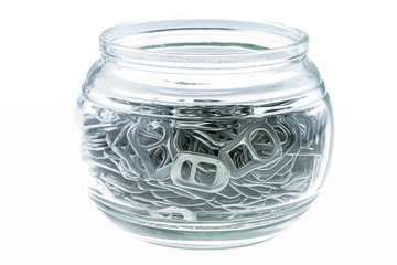 Ring pull aluminum of cans in bowl on white background