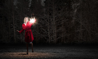 Fototapeta premium Woman with lantern