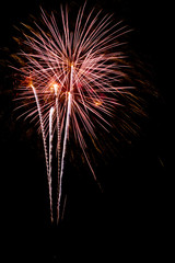 Firework streaks in the night sky.